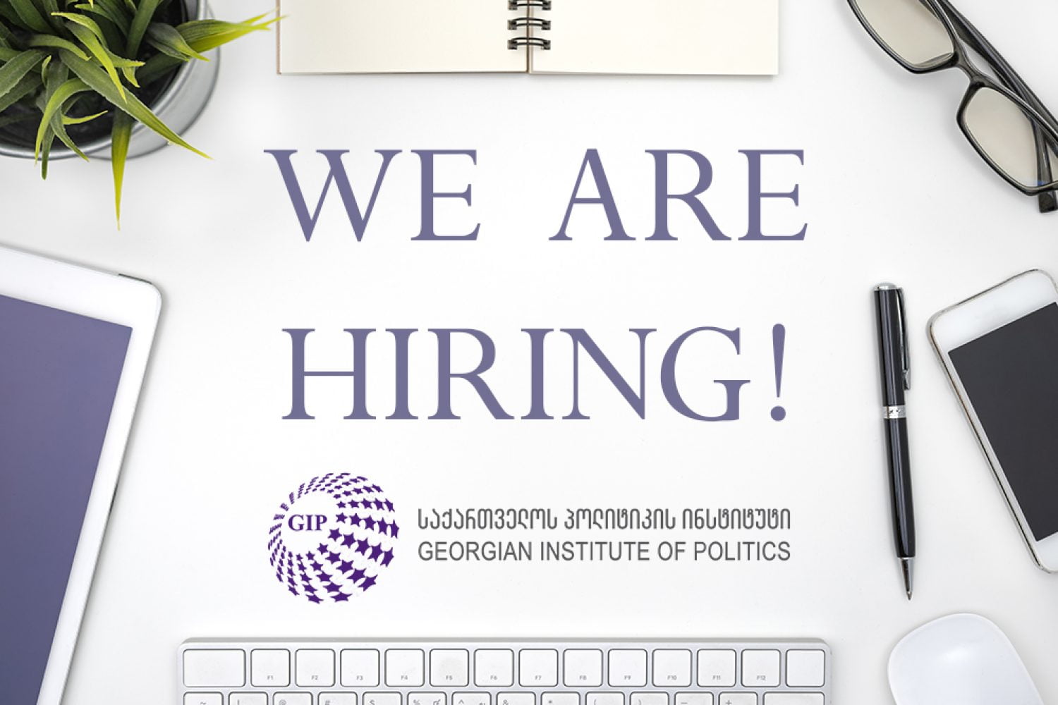 Frame with office equipment on white desk with copy space, flat lay style