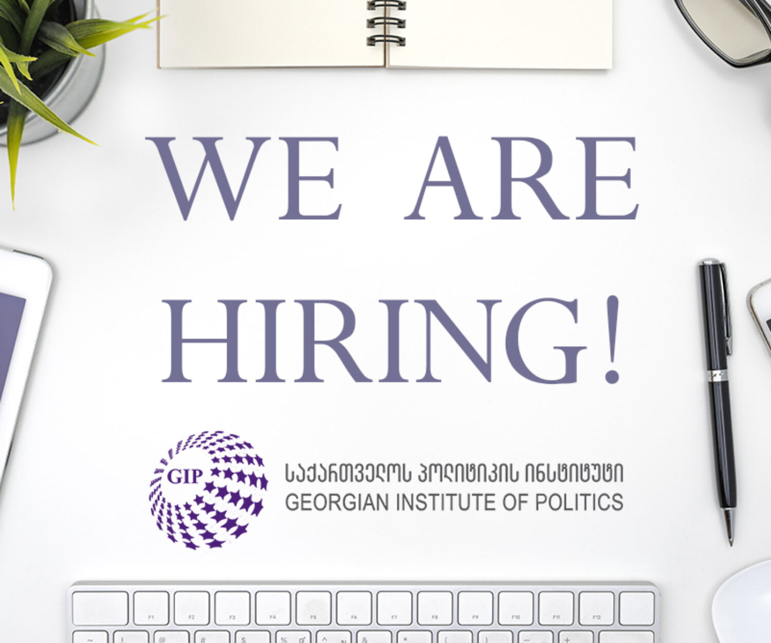 Frame with office equipment on white desk with copy space, flat lay style